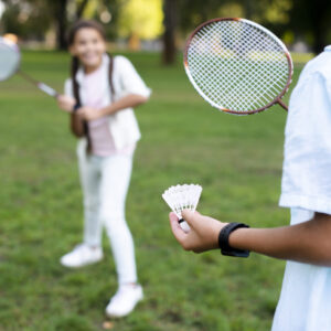 kids-playing-badminton-beautiful-summer-day