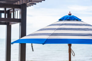 Umbrella and chair around beach sea with blue sky