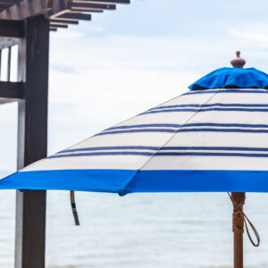 Umbrella and chair around beach sea with blue sky